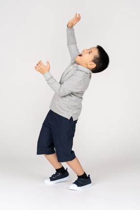 Boy leaning in profile