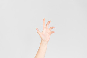 Female hand showing kind of scary gesture