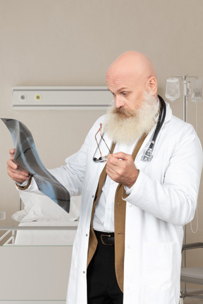 Doctor looking at x-ray
