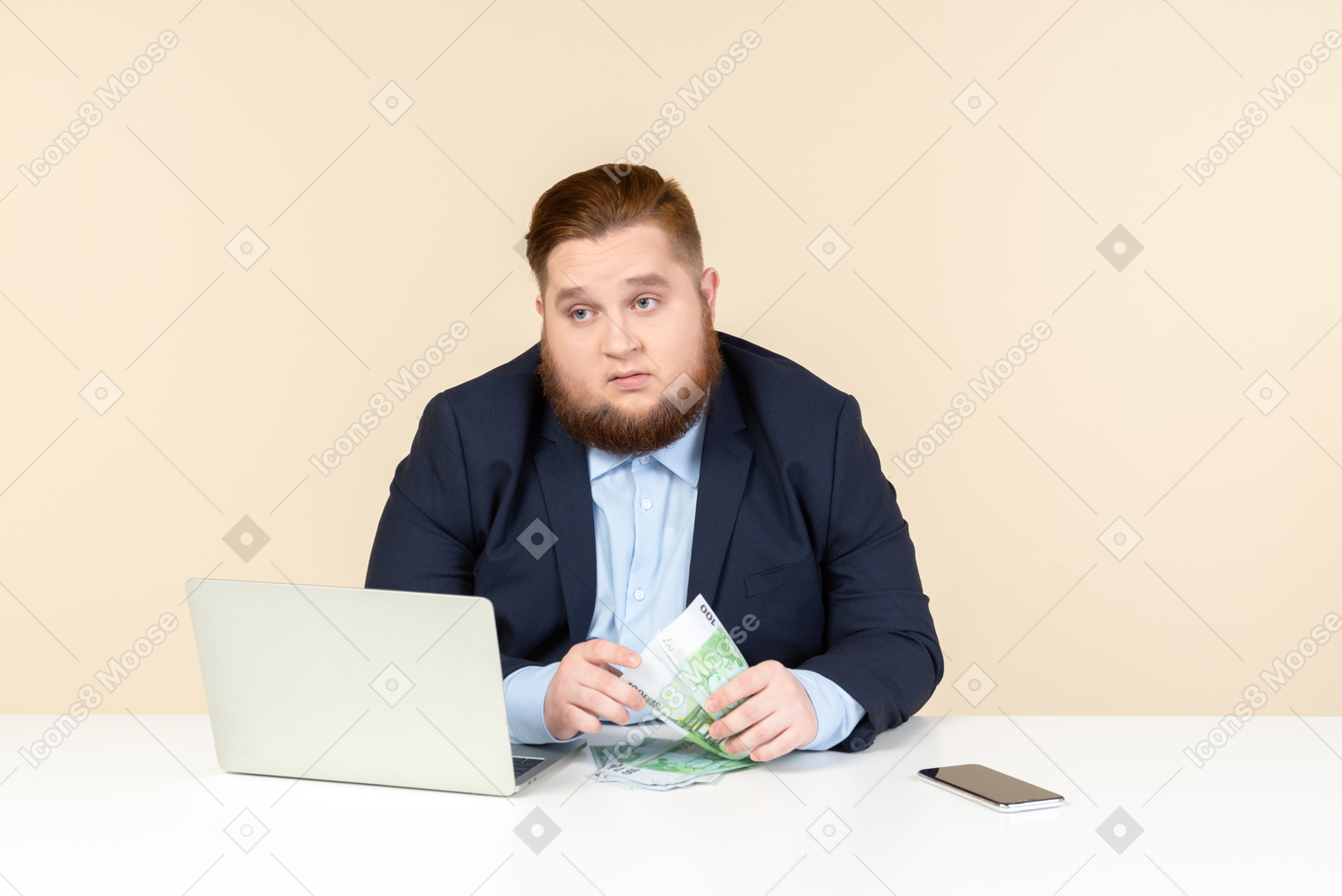 Young overweight office worker sitting at the desk and counting money