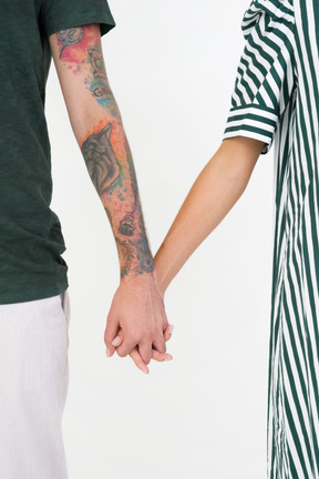 Couple holding hands