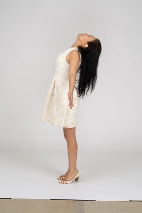 Woman in beautiful dress standing