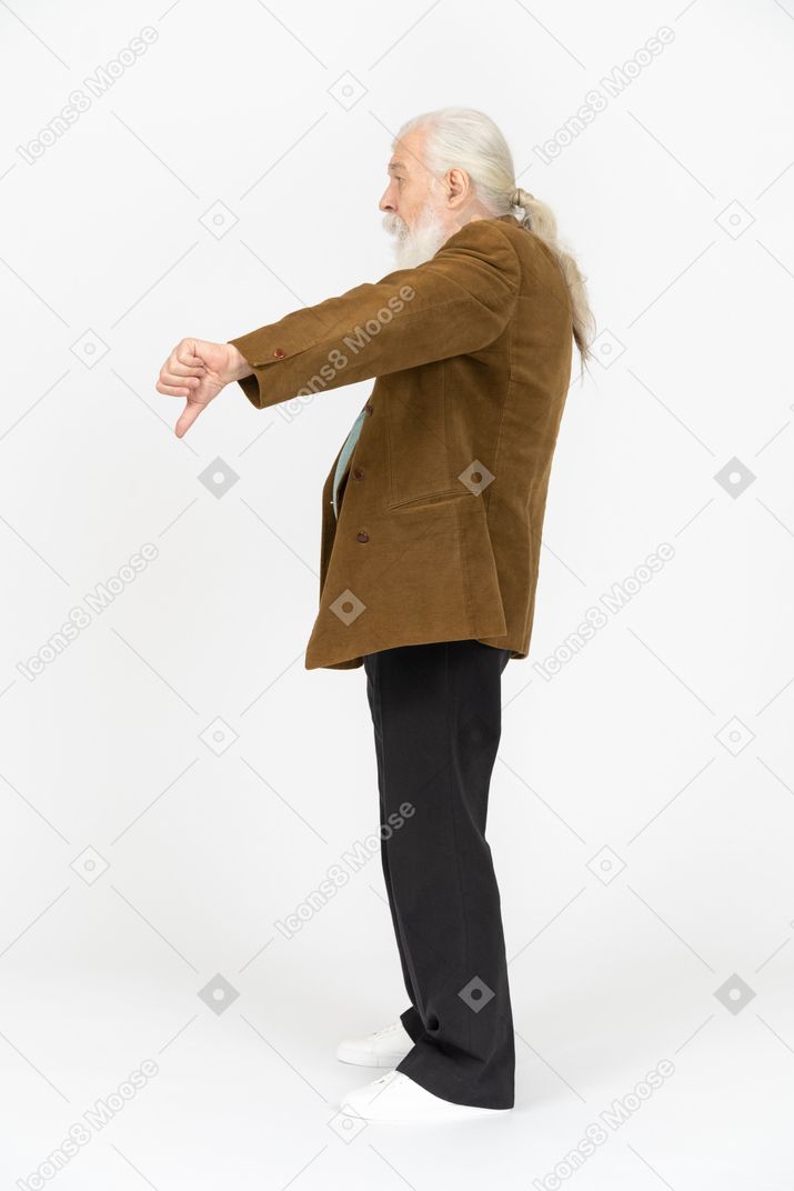 Elderly man showing thumbs down