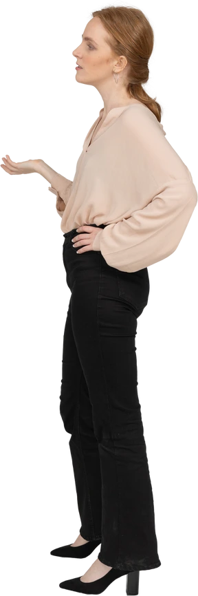 Woman in beautiful blouse standing