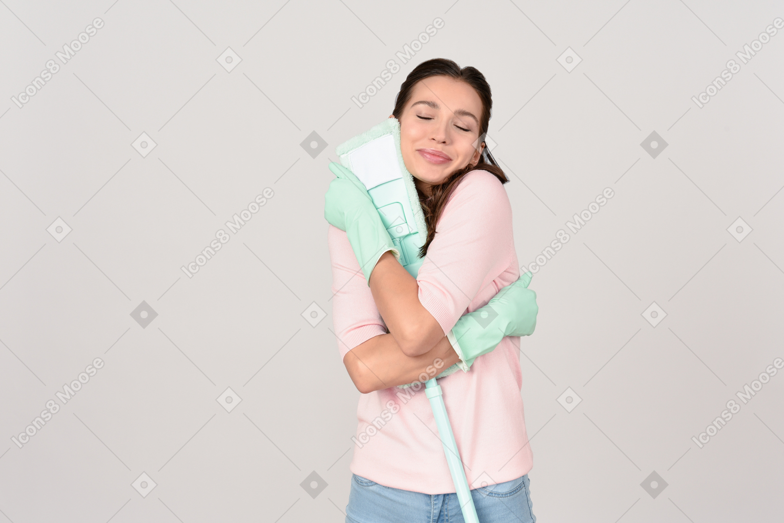 Attractive young woman pleased with her mop