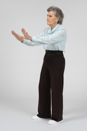 Old lady giving stop gesture