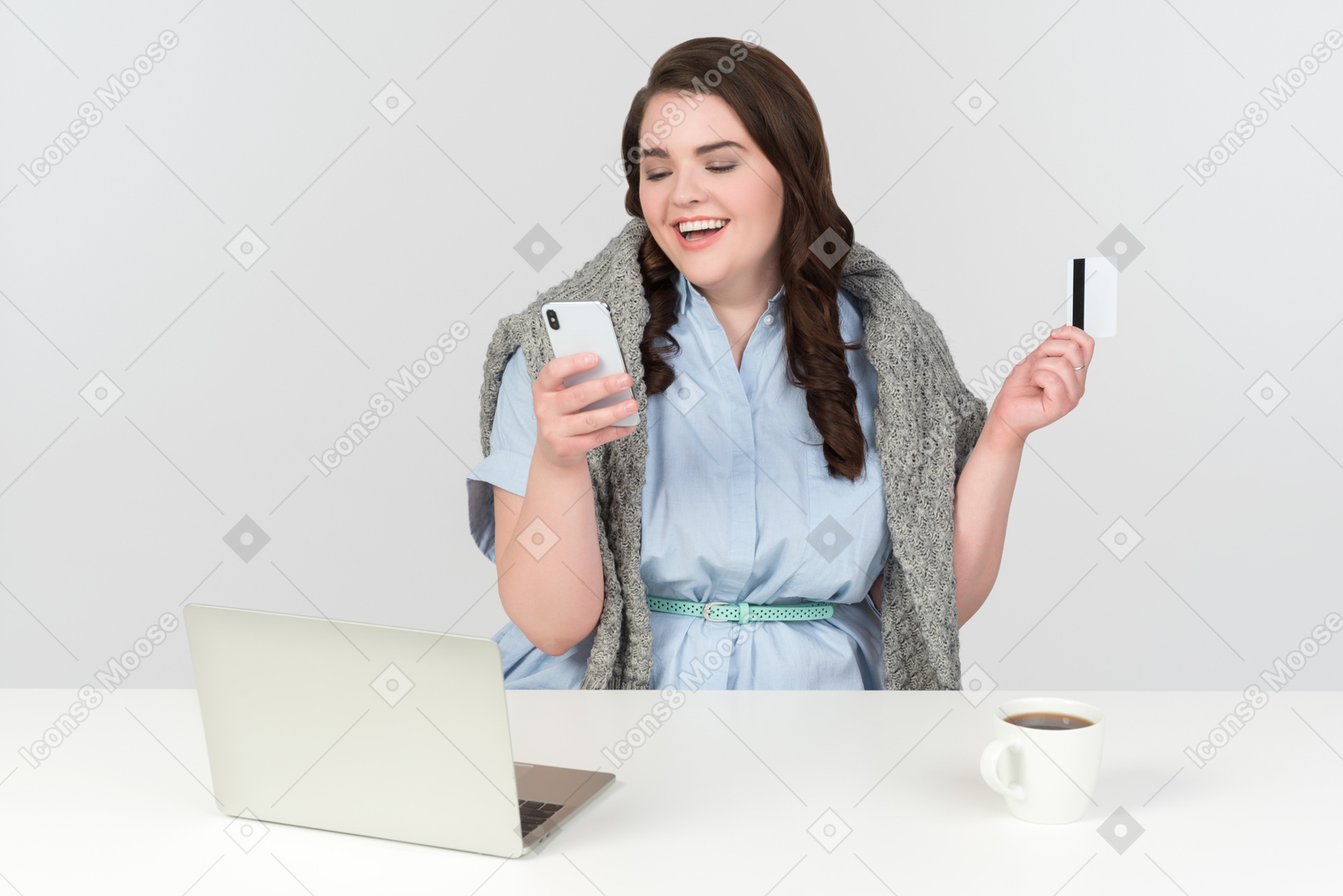 Young plus-size woman in comfy clothes doing online shopping
