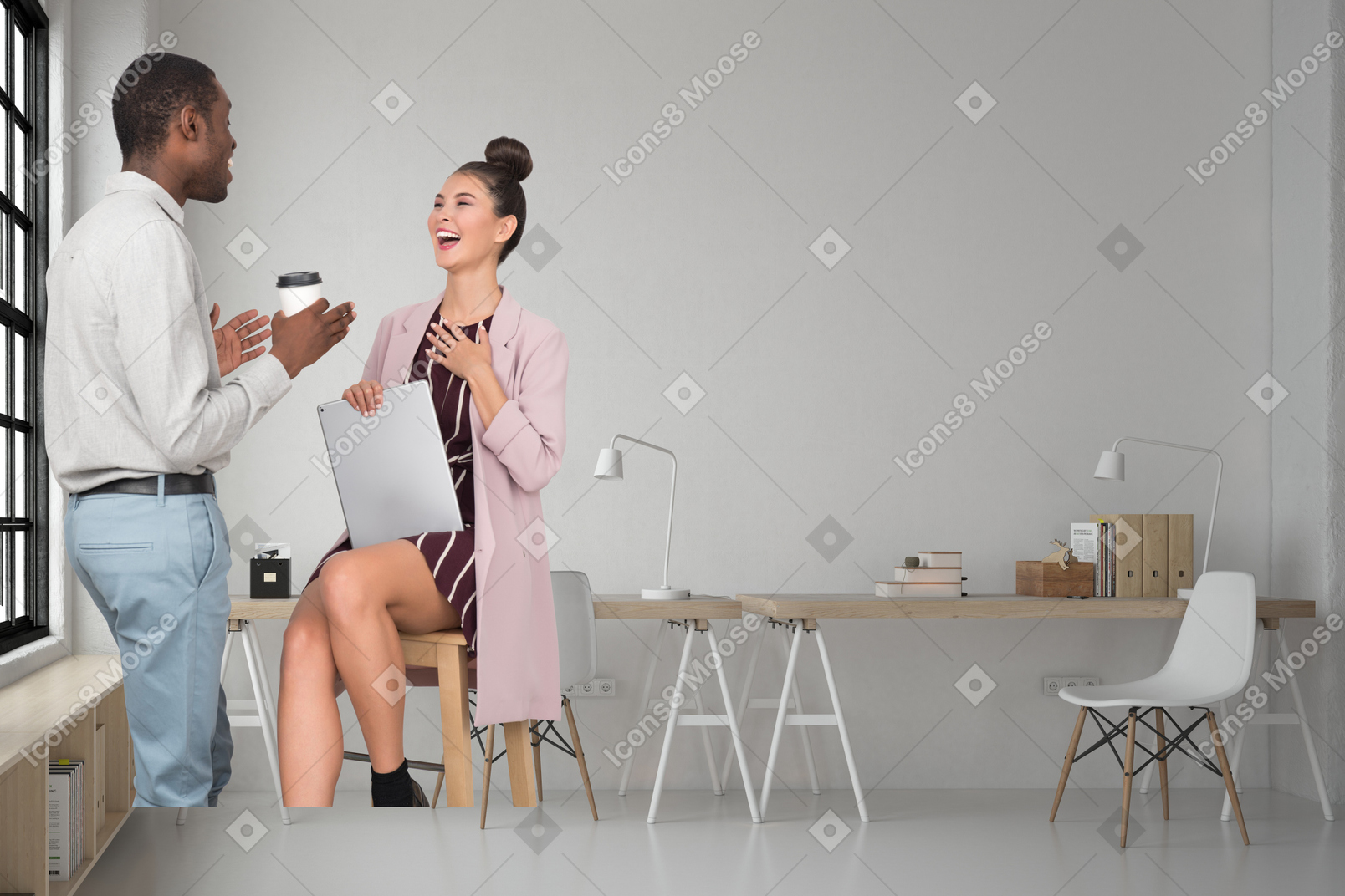 A man talking to a laughing woman