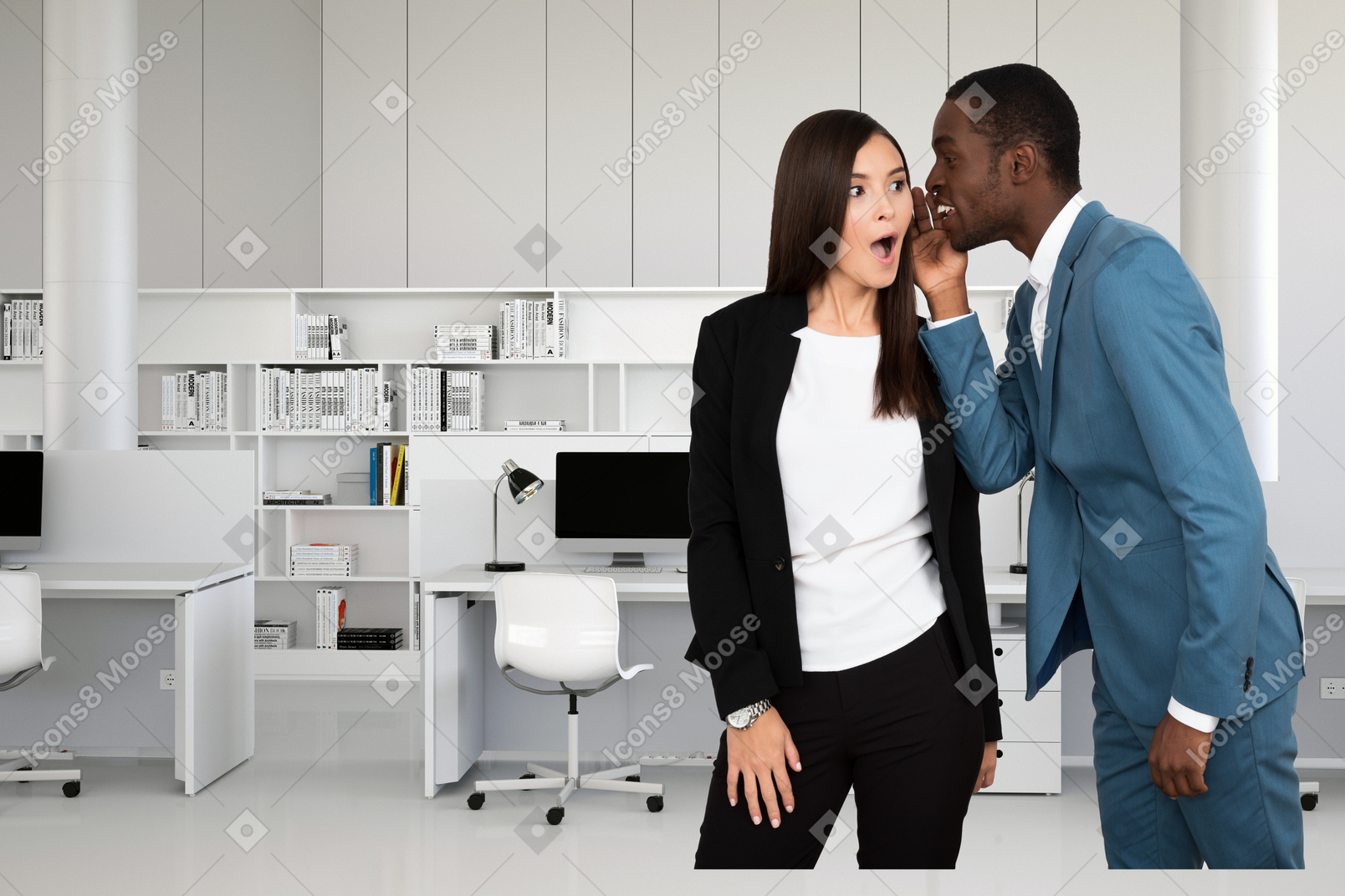 A man and woman standing in an office