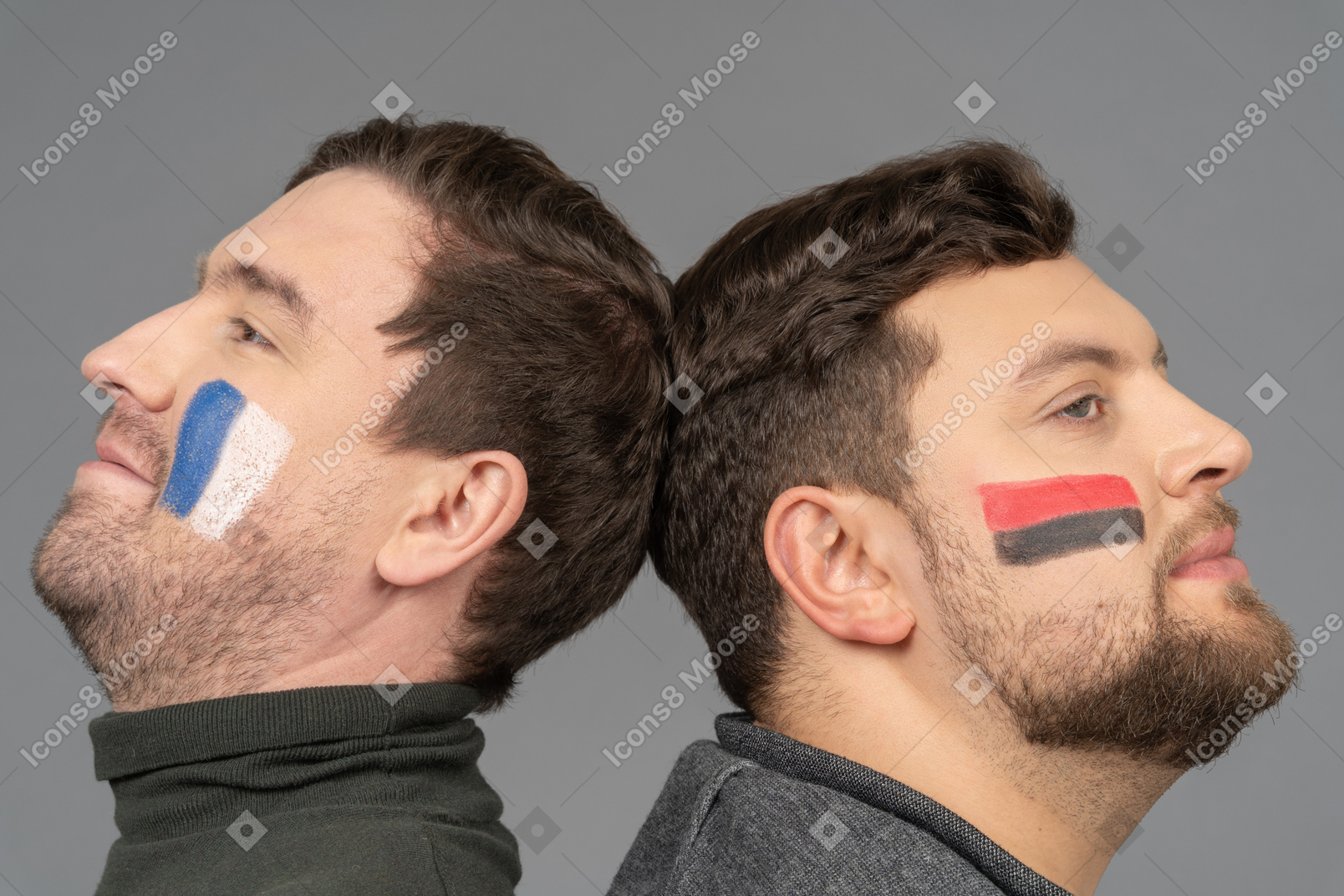 Portrait of two male football fans
