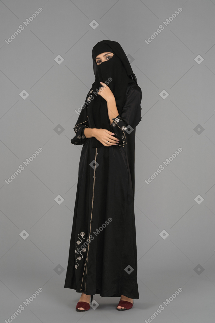 A young muslim woman posing in niqab