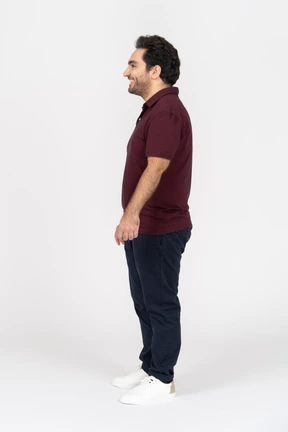 A smiling young man wearing casual clothes