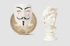 Statue bust, anonymous mask and bitcoin