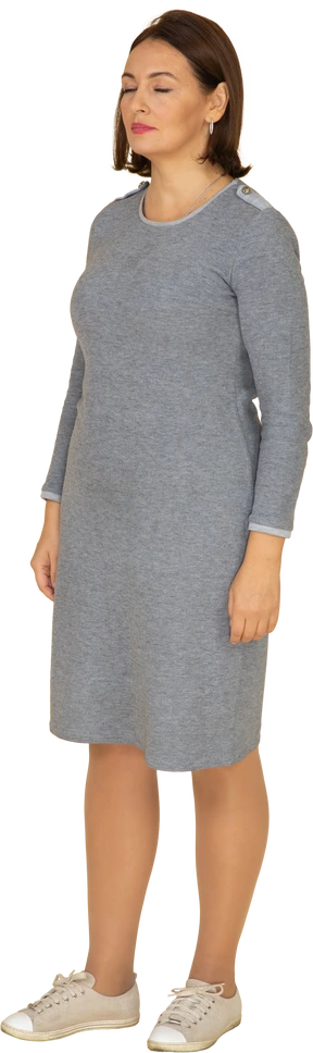 Front view of a woman in grey dress