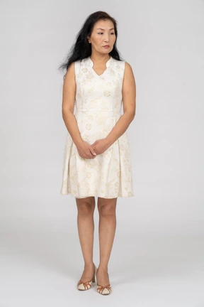 Woman in beautiful dress standing