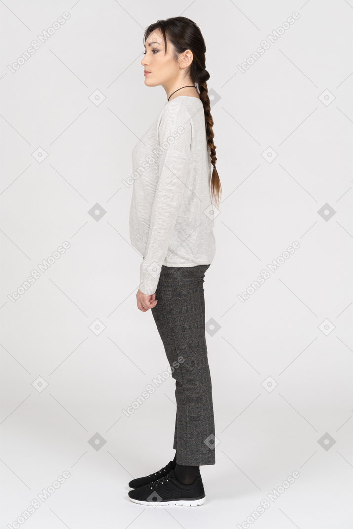 Slim young woman isolated over white background