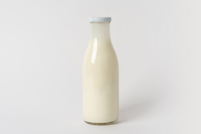 Botella de leche de vidrio