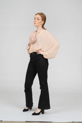 Woman in beautiful blouse standing