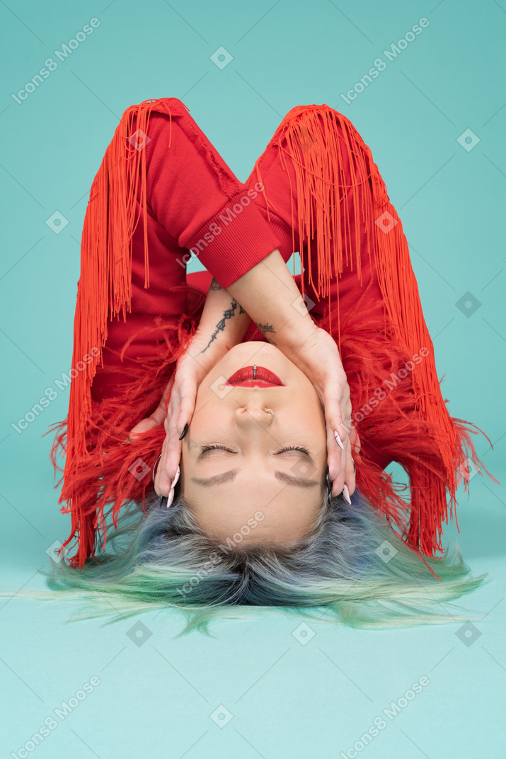 Beautiful woman lying down with her eyes closed