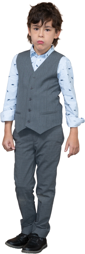 Front view of a boy in grey suit looking at camera