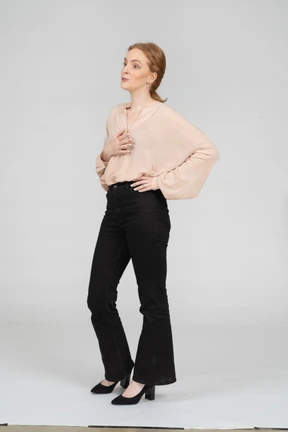 Woman in beautiful blouse standing