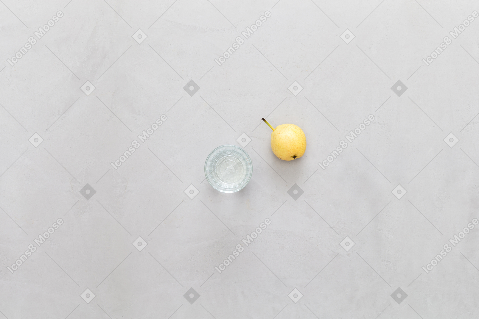 A pear and a glass of water
