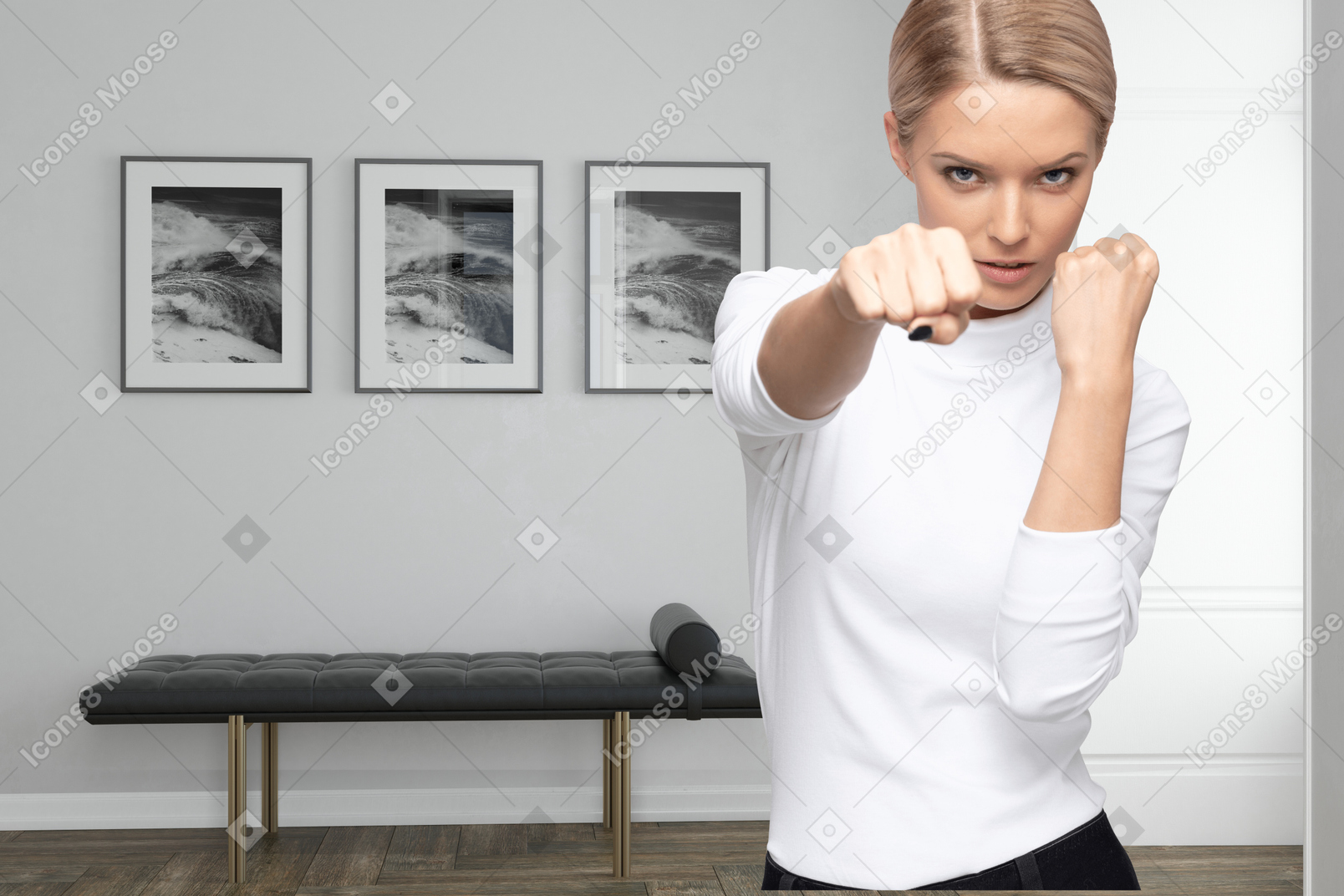 Young woman in white shirt throwing a punch