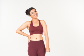 Laughing young indian girl in sportswear
