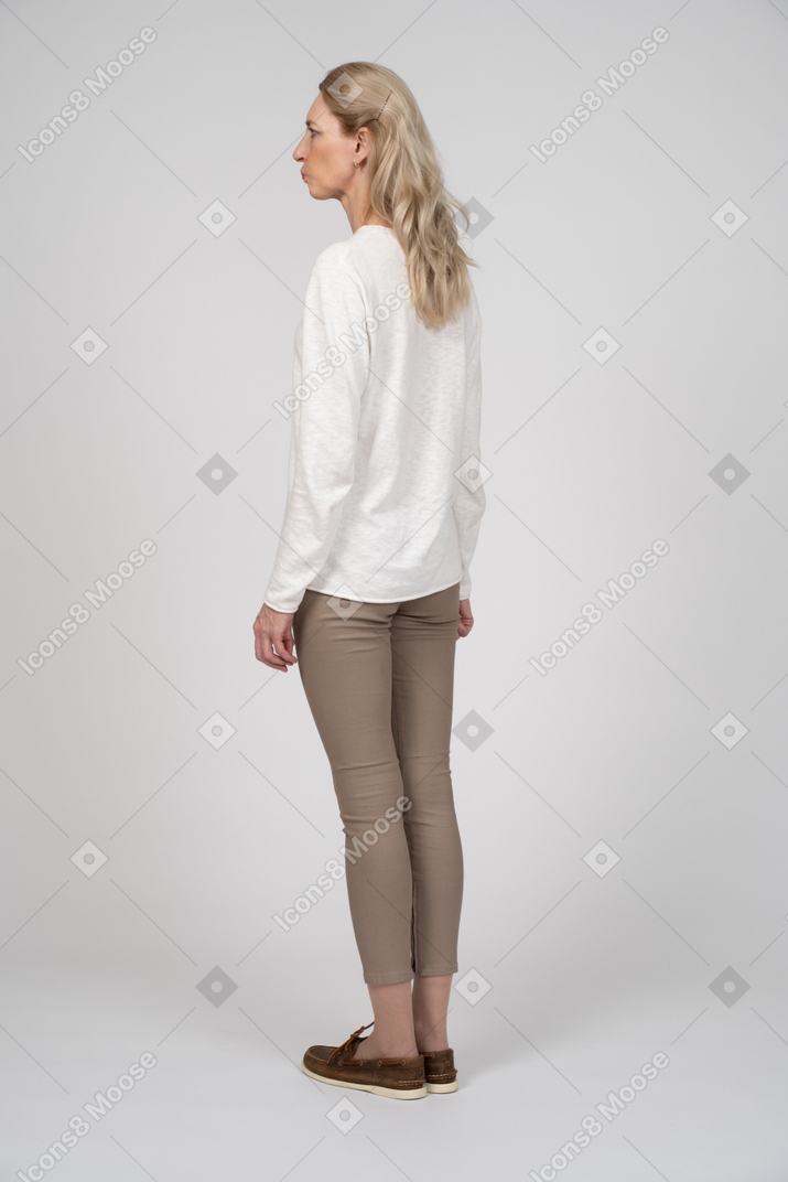 Woman in casual clothes standing