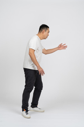 Side view of a man showing direction