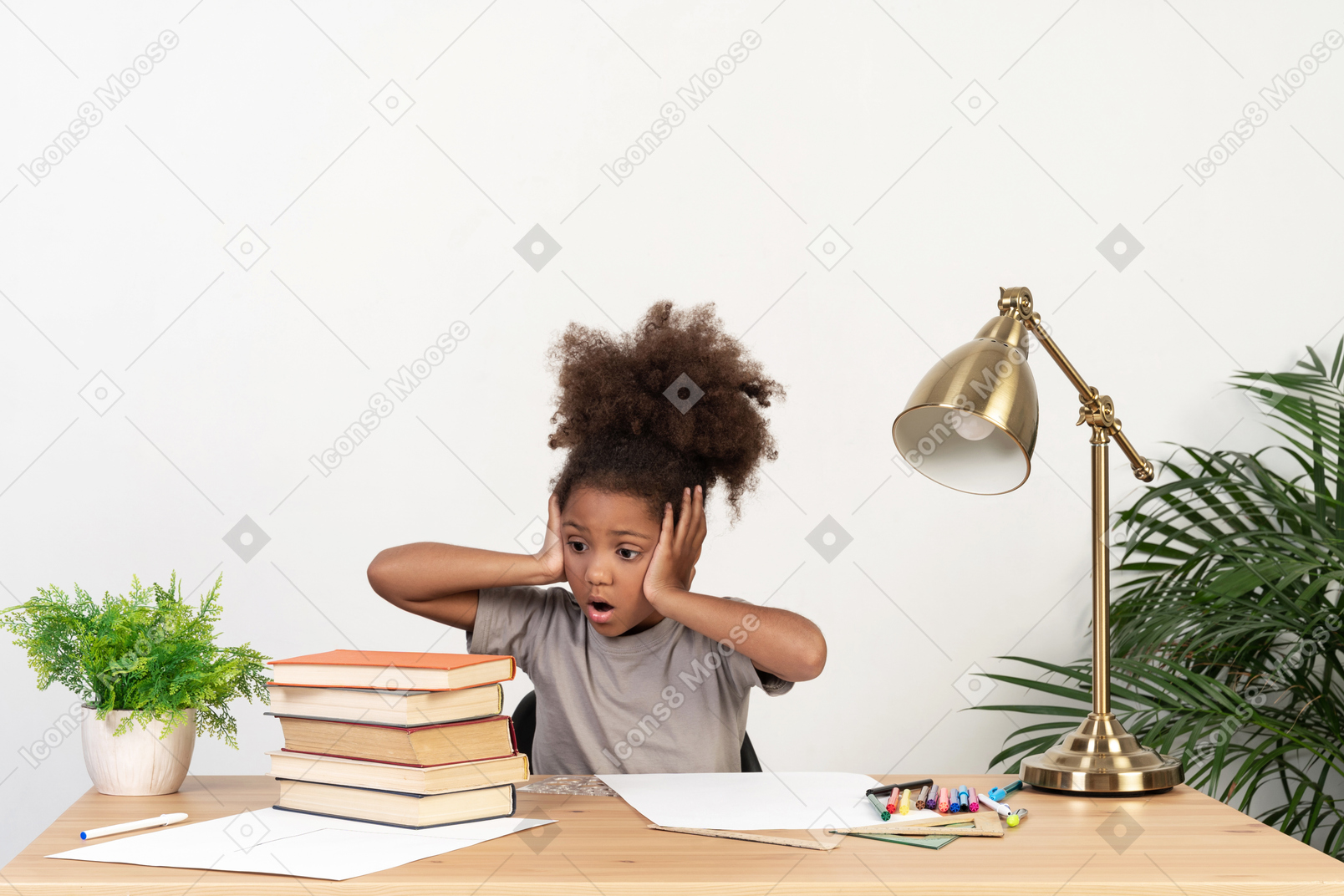 Good looking cute girl with books at the table