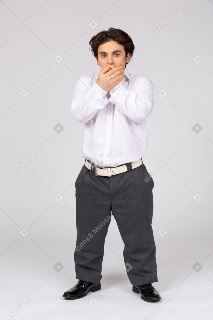 Man covering mouth with hands