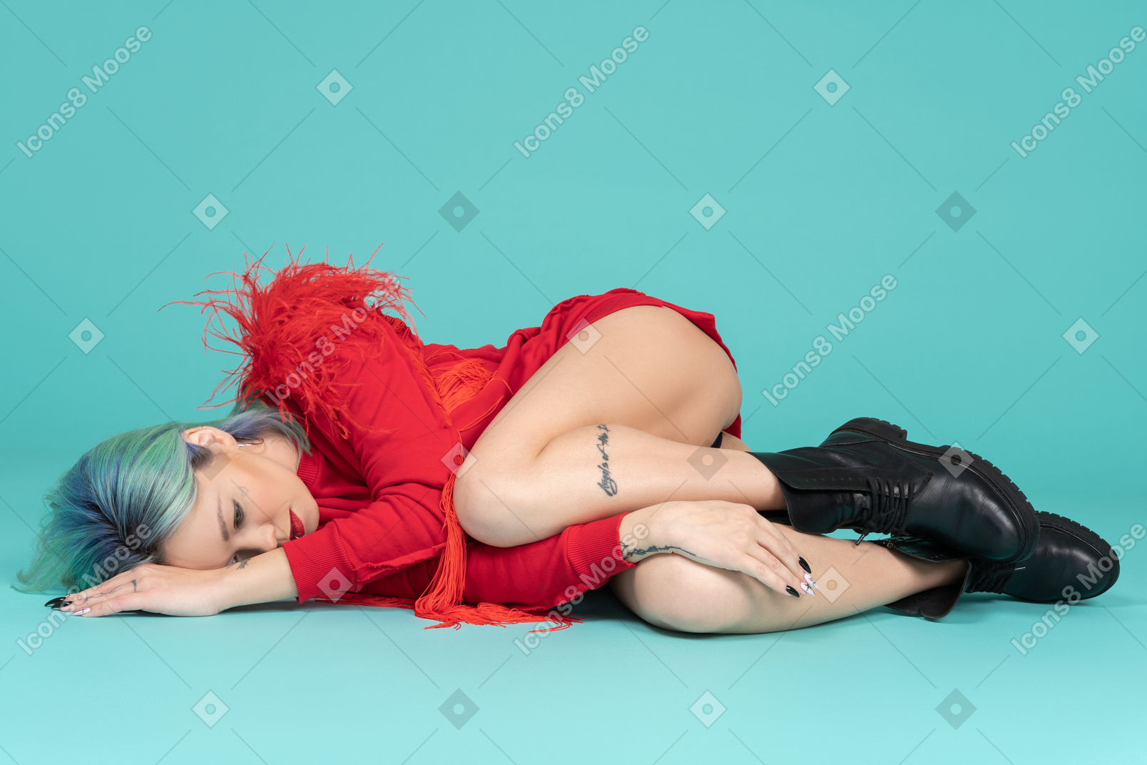 Sleeping young woman curling up in a ball