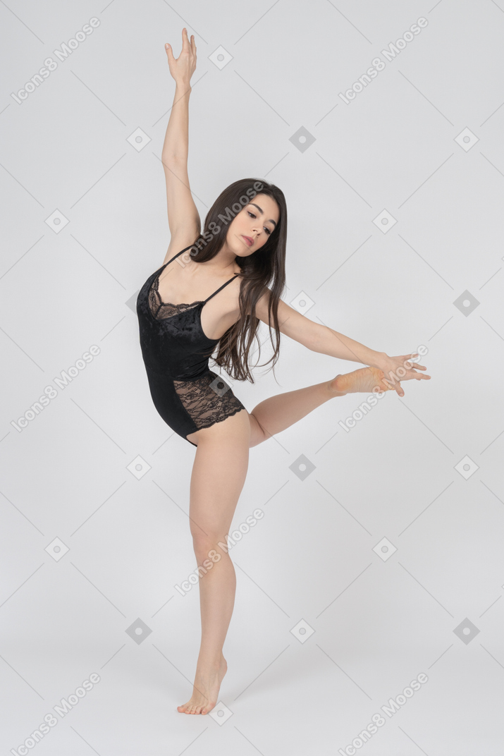 Ballerina balancing on one leg