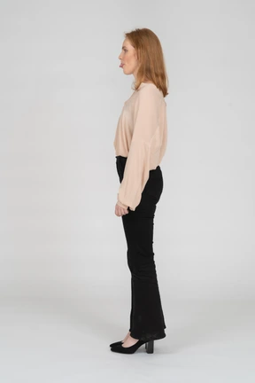 Woman in beautiful blouse standing