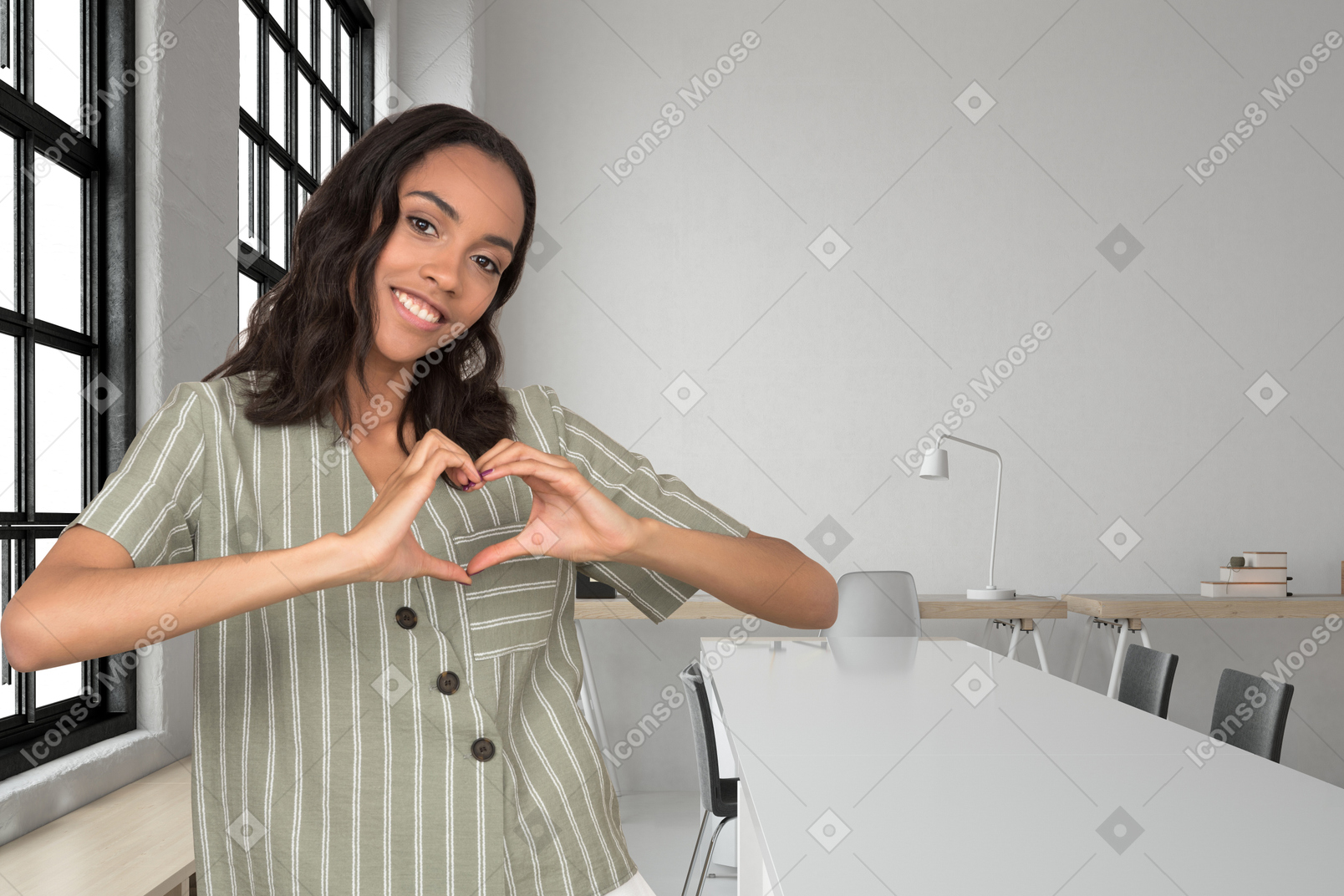 Woman doing heart hands