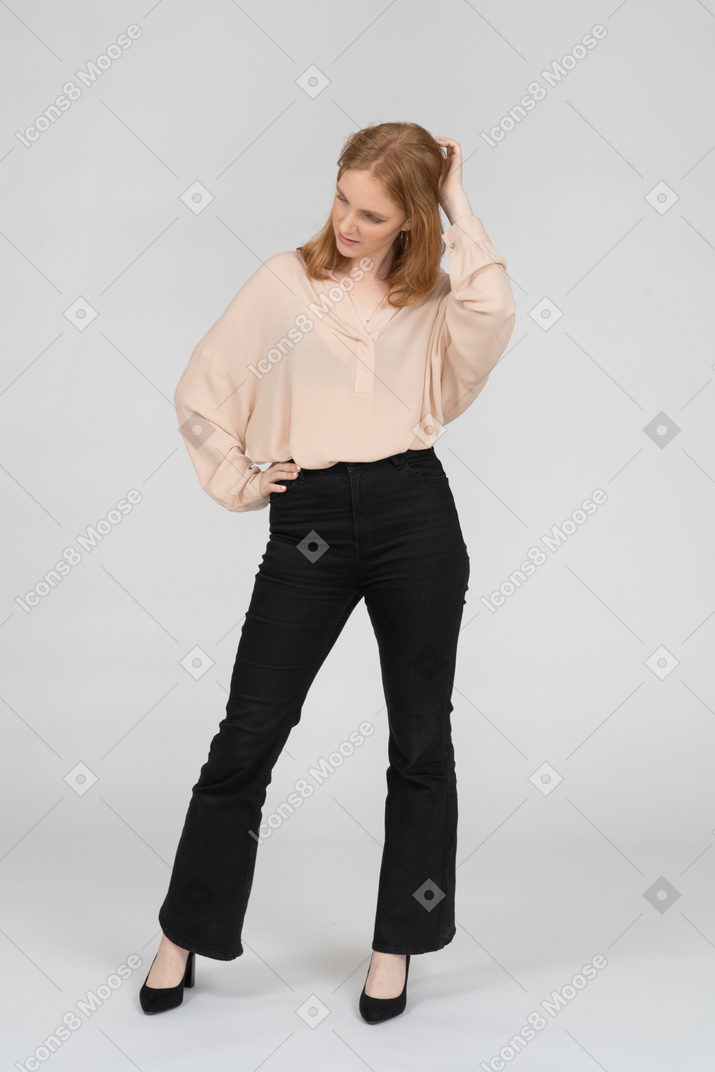 Woman in beautiful blouse standing