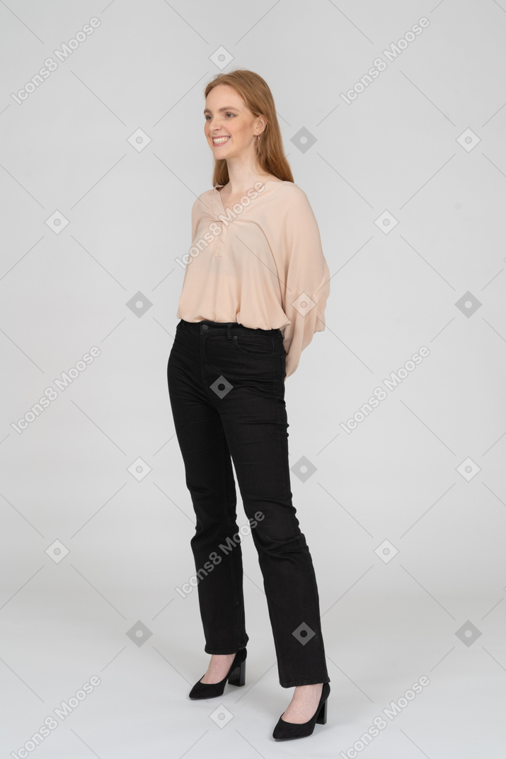 Woman in beautiful blouse standing