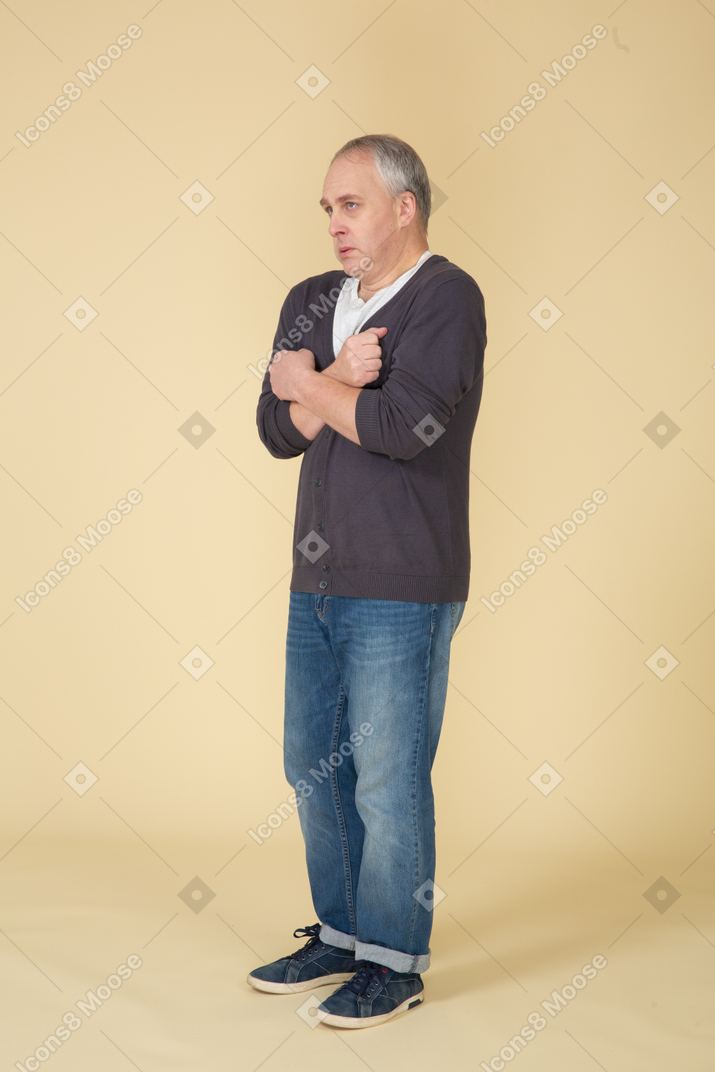 Man in casual clothes posing