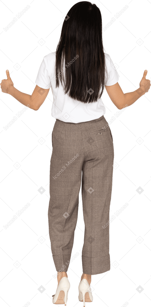 Back view of a smiling young lady in breeches and t-shirt showing thumbs up