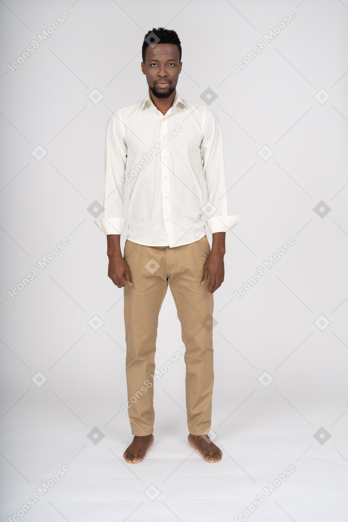 Man in white shirt standing