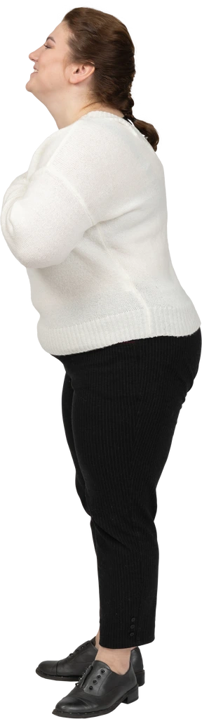 Side view of a happy plump woman in casual clothes