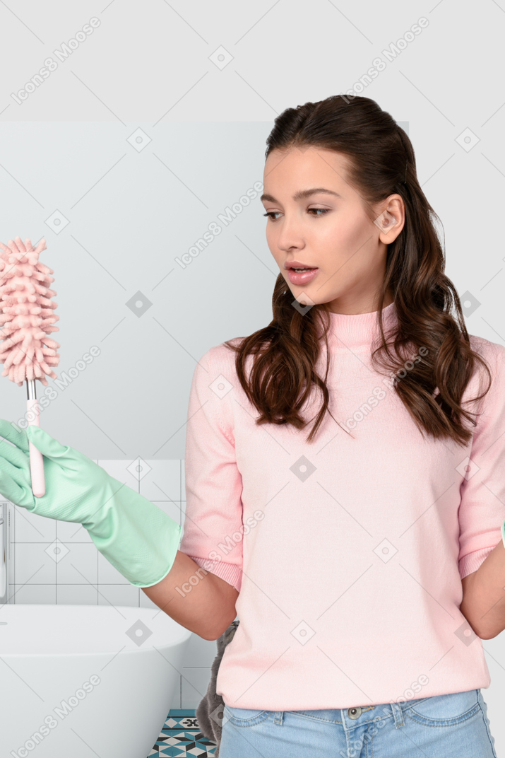 Woman holding tube brush