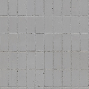 Pared de textura de hormigón gris con azulejos