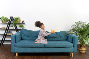 Cute girl on the sofa