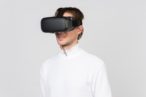 Man in vr headset enjoying virtual reality