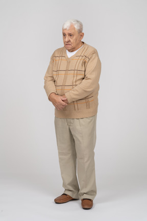 Front view of an old man in casual clothes