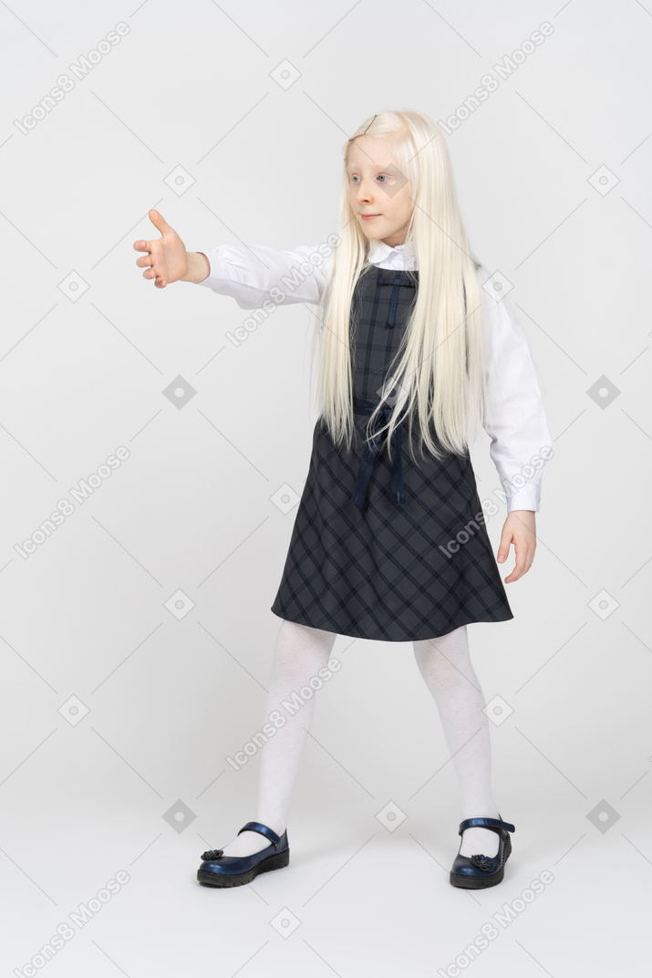 Schoolgirl offering a handshake