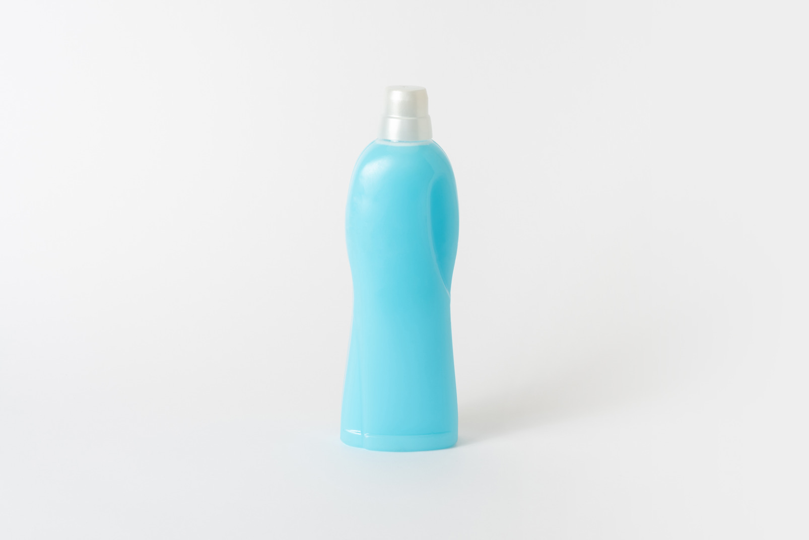 Blue household bottle with silver cap