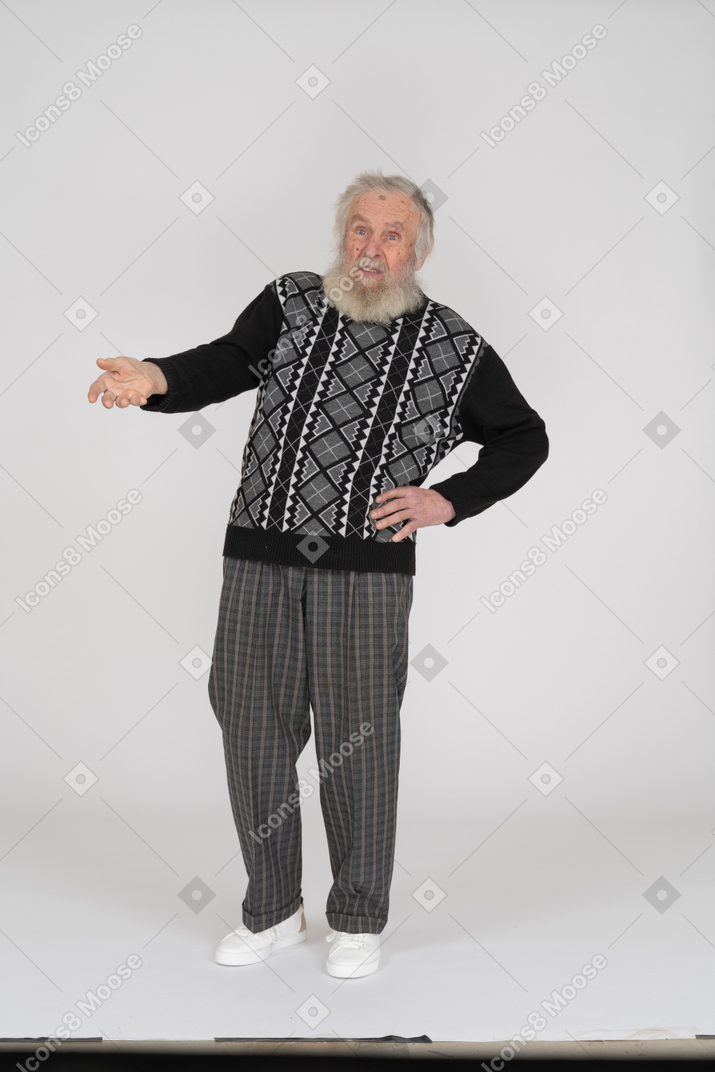 Questioned old man with hand on hip